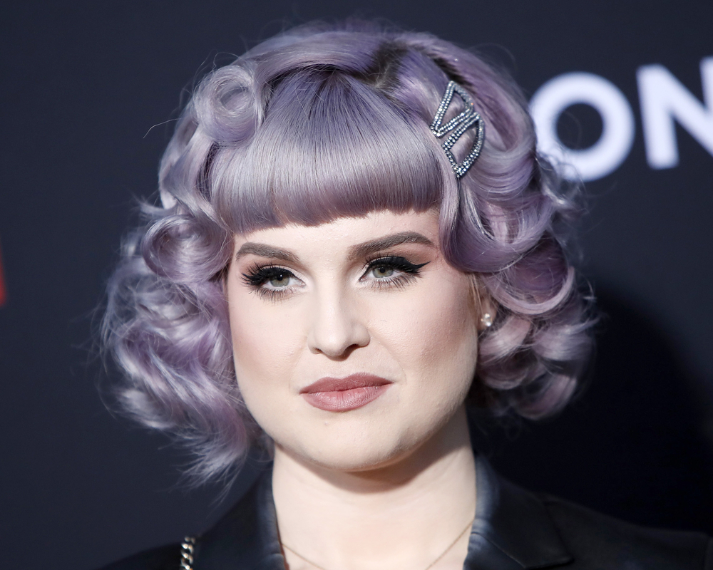 Kelly Osbourne with a curly purple bob at the premiere of Angel has Fallen