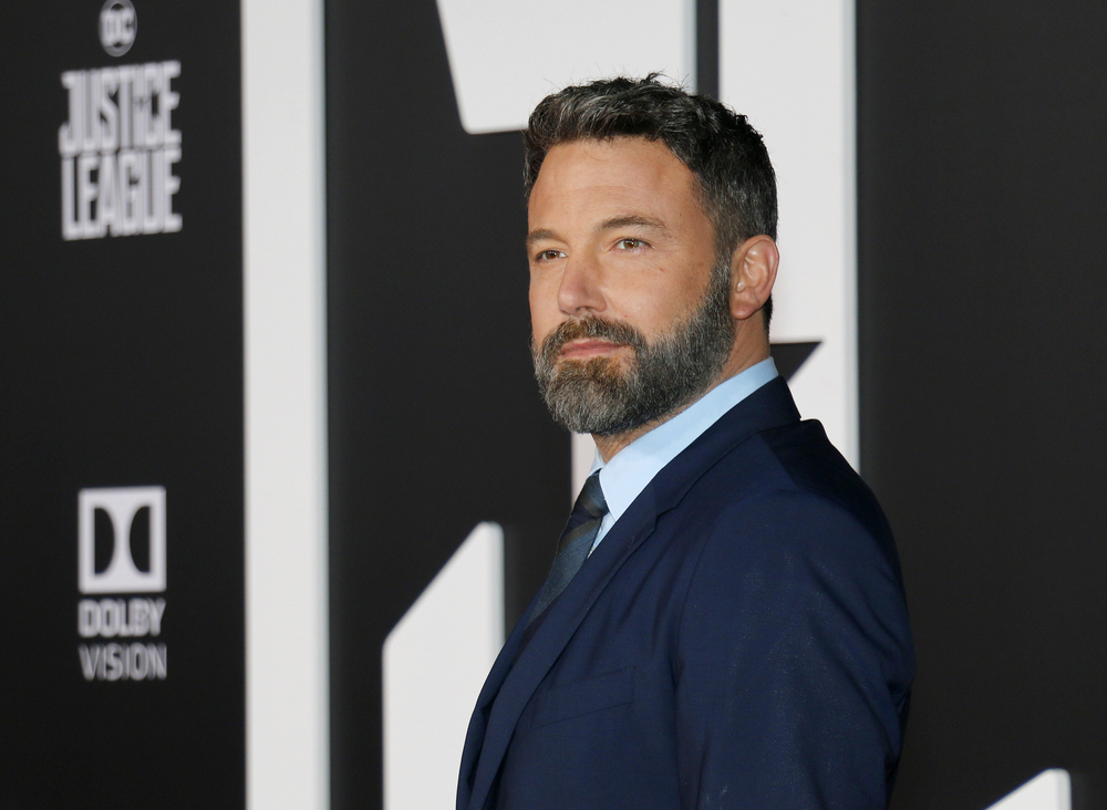 Ben Affleck wearing a blue suit. Photo by PopularImages