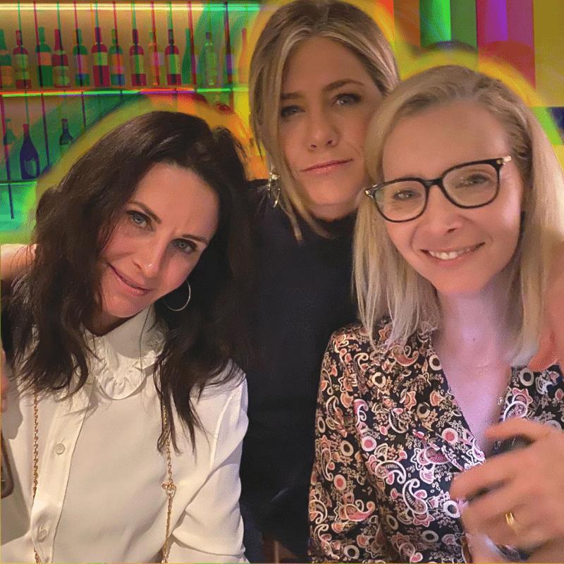 Jennifer Aniston sits with Courtney Cox and Lisa Kudrow with a weird background